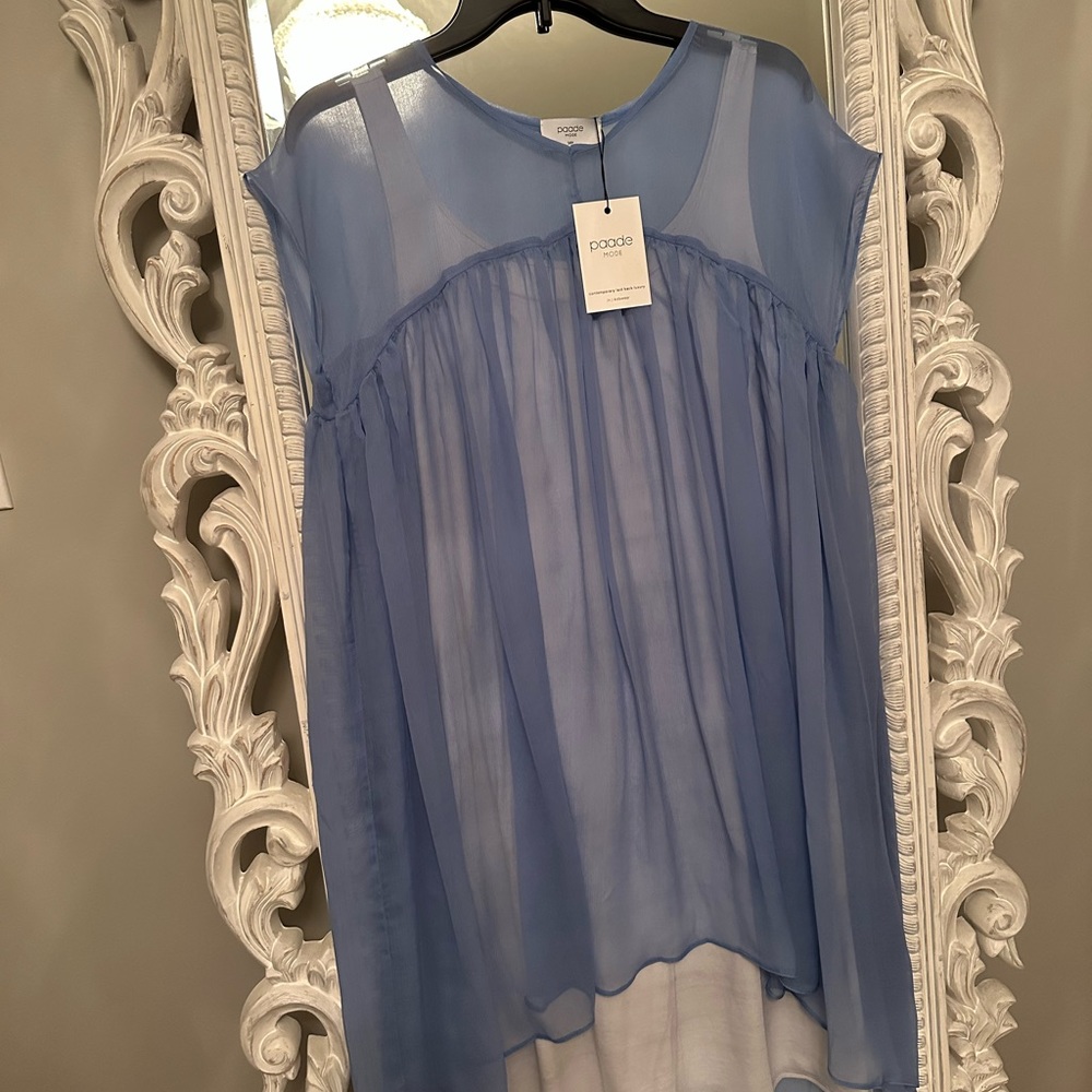 Stunning Paade Mode dress. Casual is mixed with contemporary luxury & elegance.